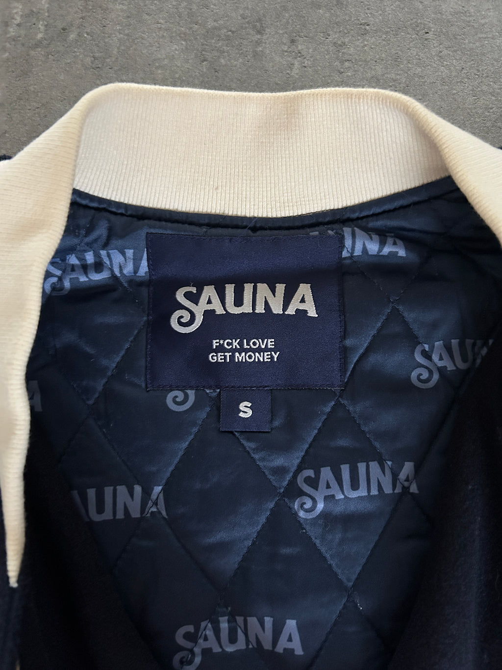 SAUNA “MONEY OVER EVERYTHING” VARSITY JACKET (S)