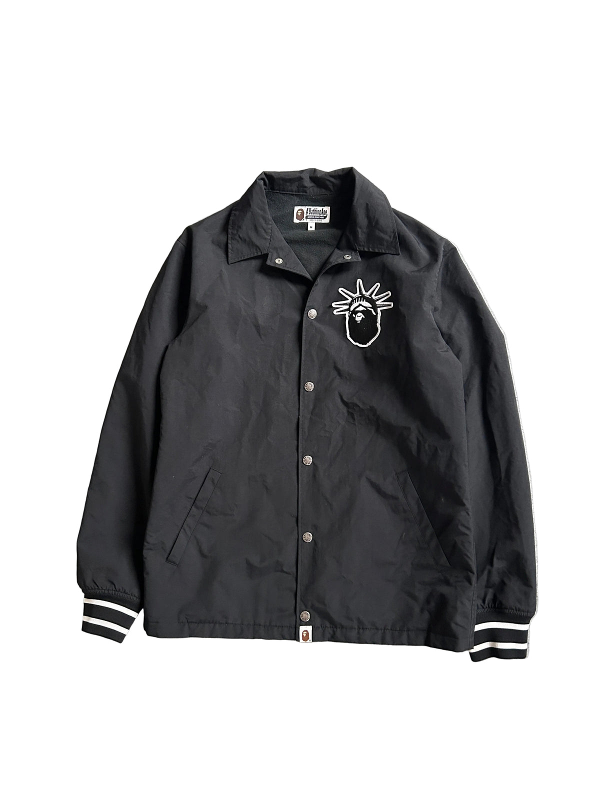 A BATHING APE STATUE OF LIBERTY COACH JACKET (M)