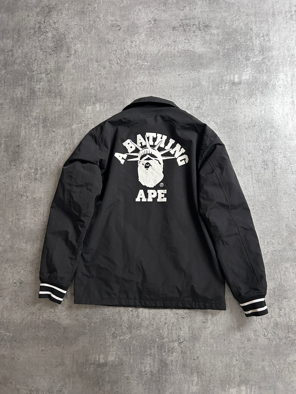 A BATHING APE STATUE OF LIBERTY COACH JACKET (M)