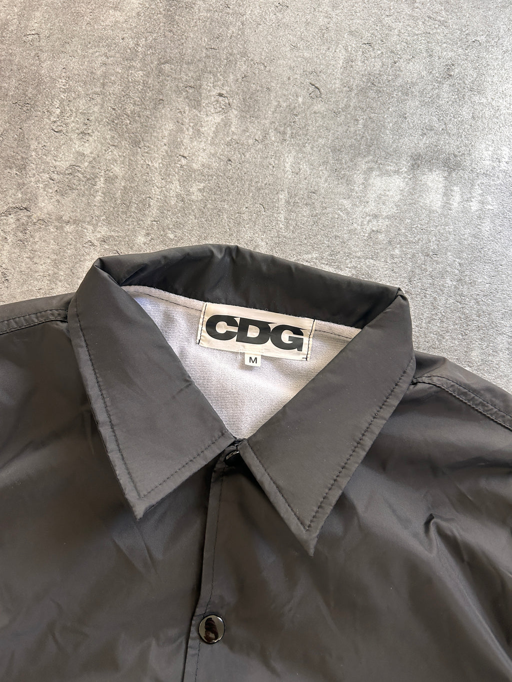 CDG NAGOYA POP UP COACH JACKET (M)